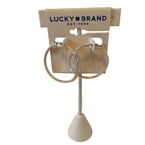 Matte Silver Toned Embossed “Love” Hoop Earrings.